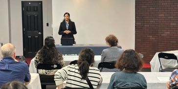 Dr Gupta presenting a lunch and learn workshop to corporate employees