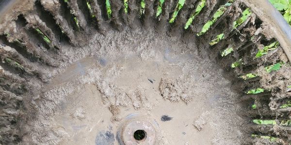 A picture of a blower wheel about to be cleaned during an air quality Maintenance in Lewisburg Tn.