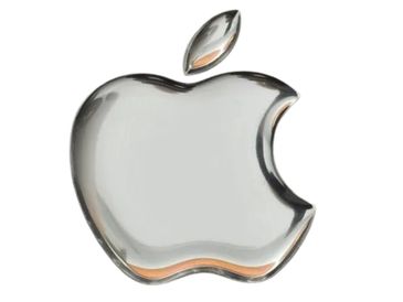 Shiny metallic Apple logo with a bite mark on a white background.