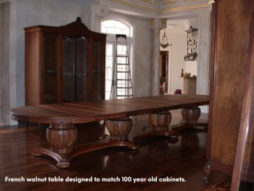 Dining room table in French Walnut is designed to match 100 year old cabinets.