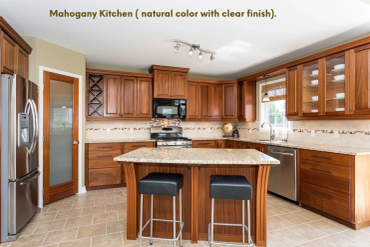 Mahogany kitchen in natural colour with clear finish.