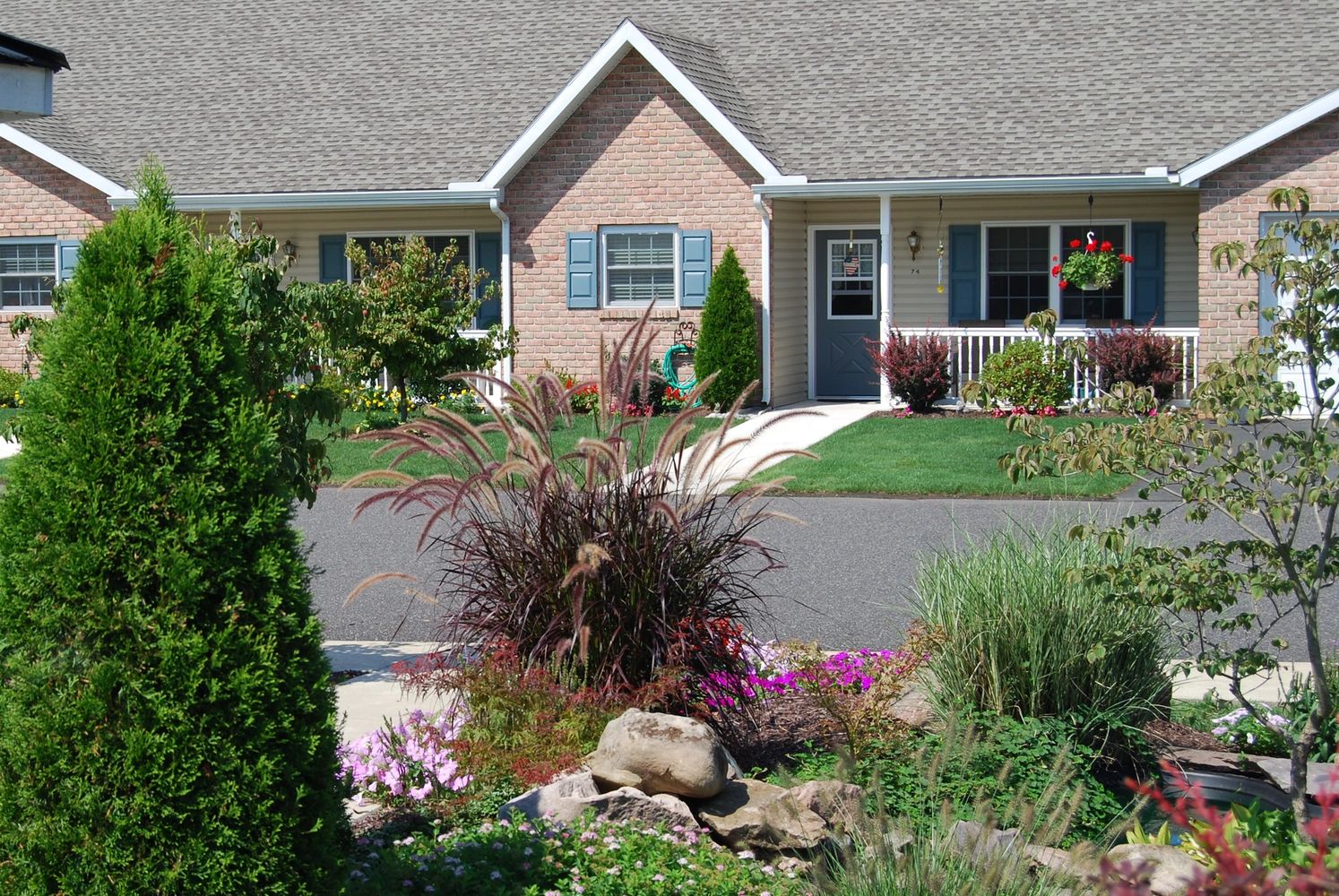 Gazebo and tri-plex of homes