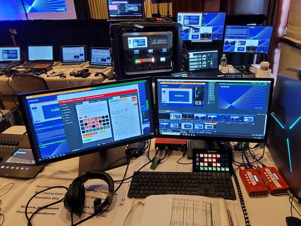 Live Stream vMix rig with controllers sitting on a tech table at FOH during a hybrid live event.