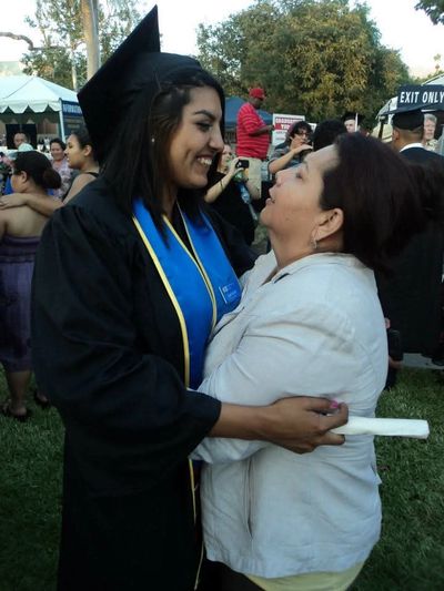 My mami and I at my college graduation ceremony.