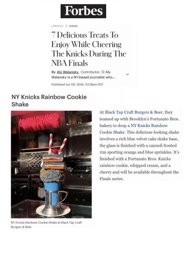 NY Knicks Rainbow Cookie Shake topped with colorful sprinkles and whipped cream.