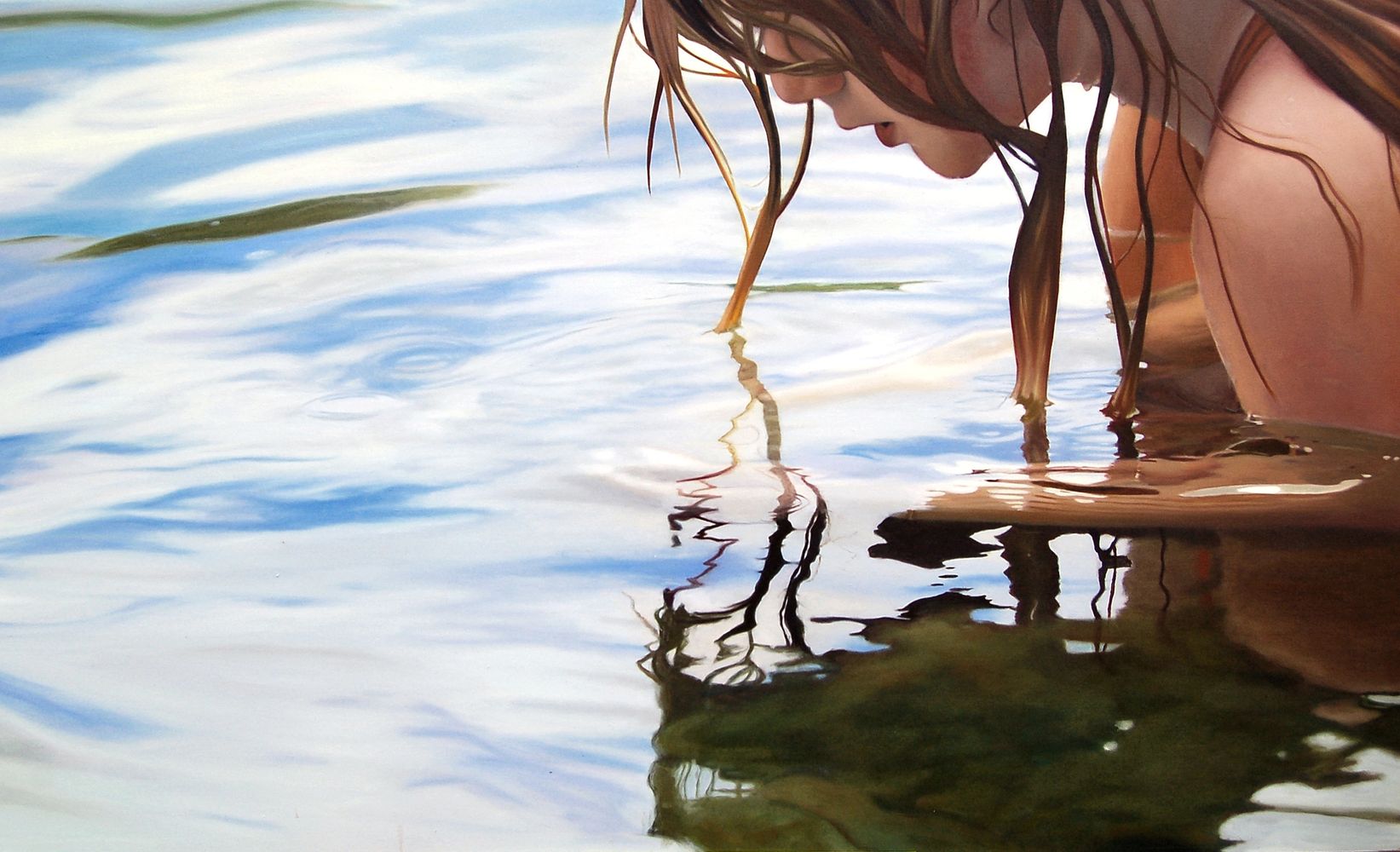 Three adults focused on drawing portraits on easels in an art class.