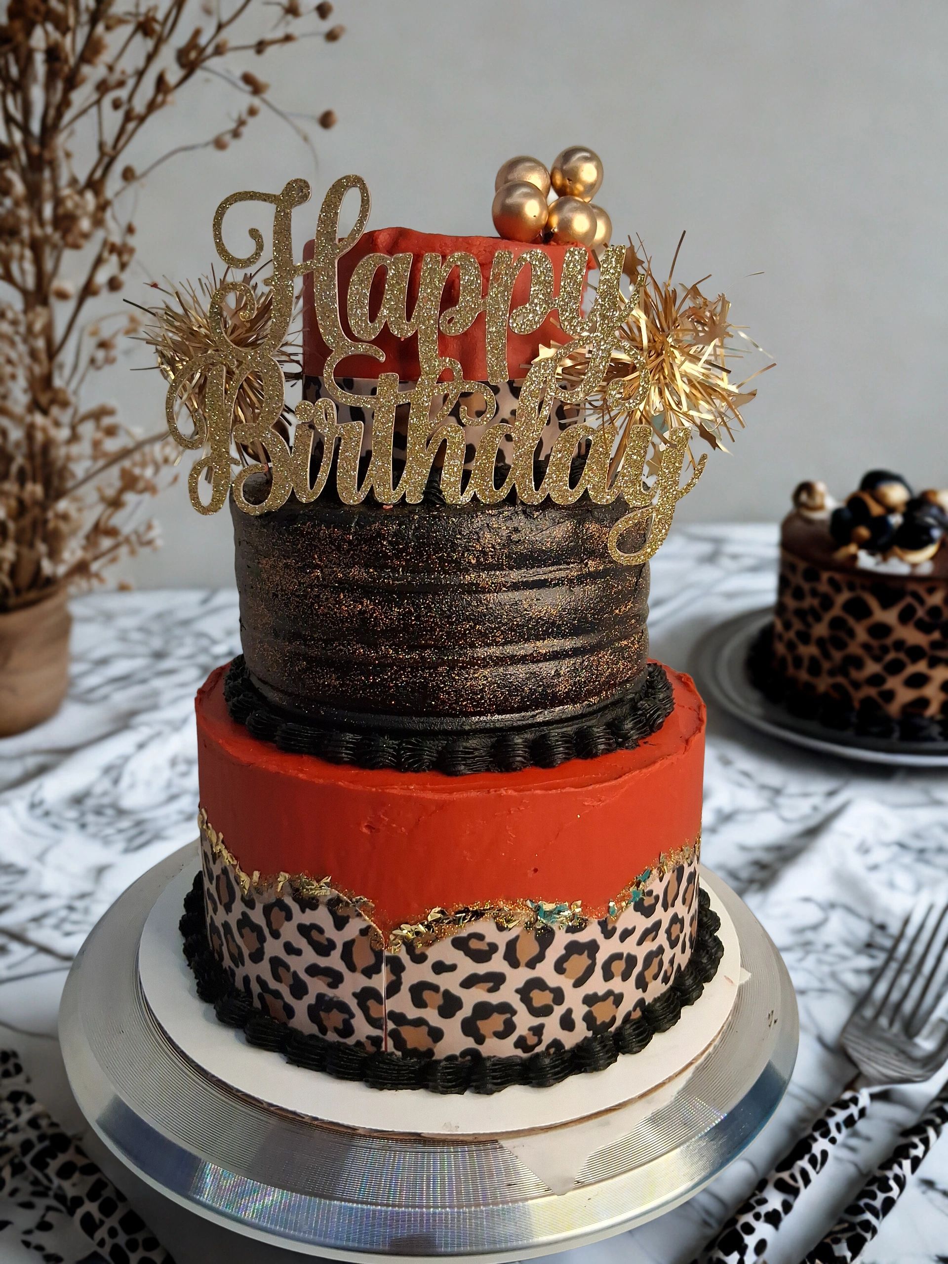 Animal print themed birthday cake