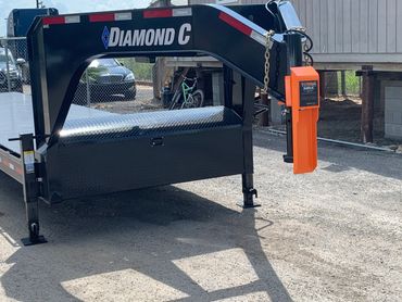 A trailer with Diamond C logo