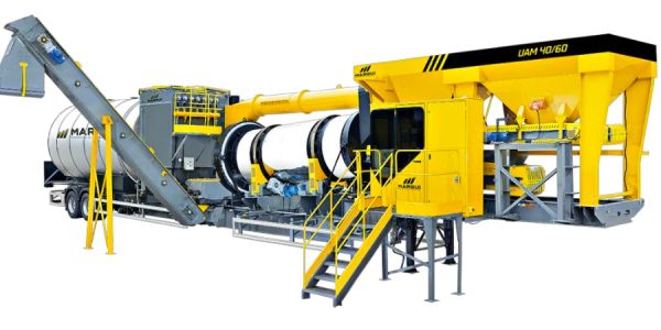 Yellow and black industrial concrete mixing machine.