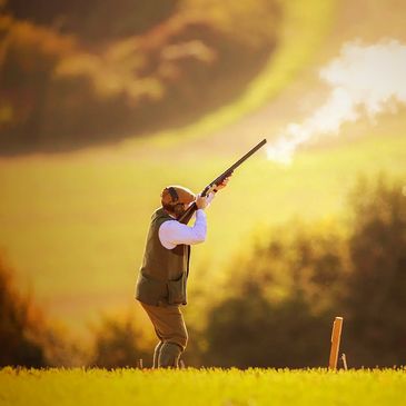 UK Gentlemen in shooting gear shooting into the air