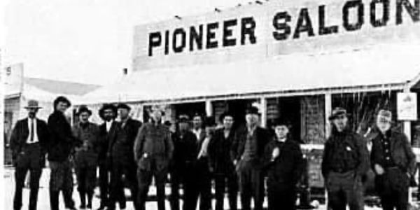 old picture of folks at Pioneer Saloon