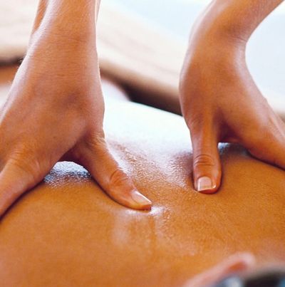 A woman enjoying a therapeutic massage at our spa