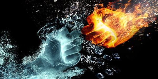 A fiery fist clashes with an icy fist in a dramatic battle.