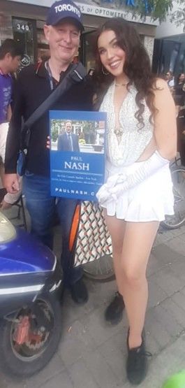 Paul Nash, candidate for Toronto City Council, Ward 10, Spadina-Fort York, standing with Scharlina, 