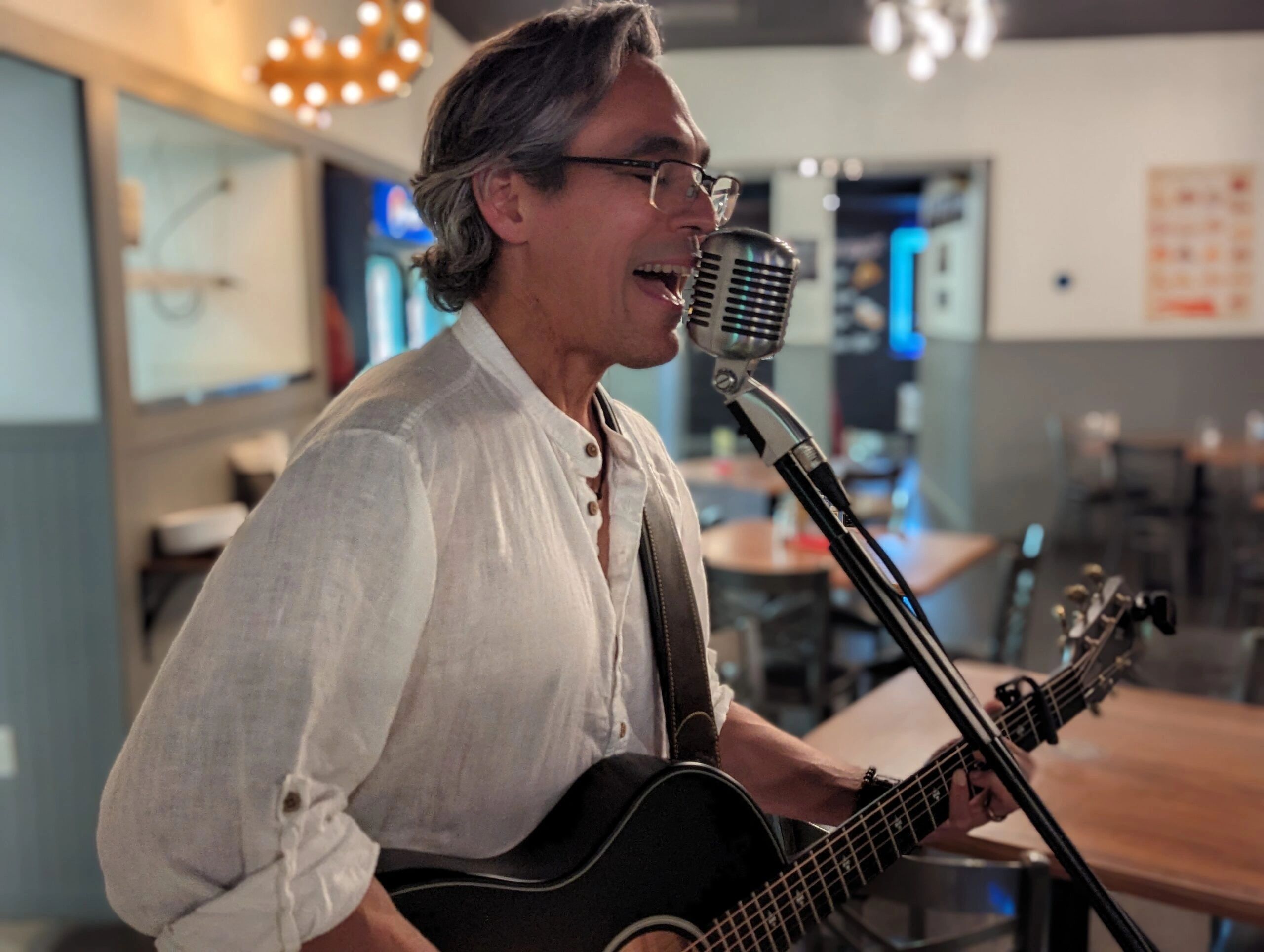 Ernesto Burden performing June 15 at The Pizza Man Bar & Grille. Photo/Carol Robidoux