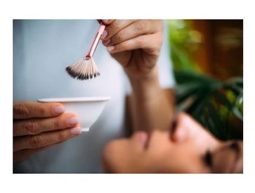 Provider preparing chemical peel