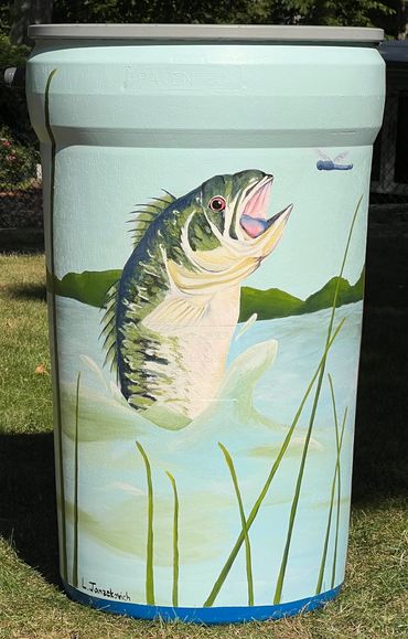 Painted trash can with a fish jumping in water scene.