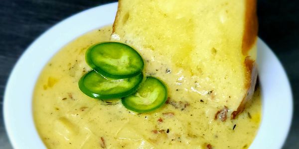 Creamy loaded potato soup: gouda, bacon, diced potatoes, and herbs w/  toasted pretzel crouton