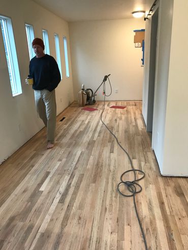Refinishing the hardwood floor