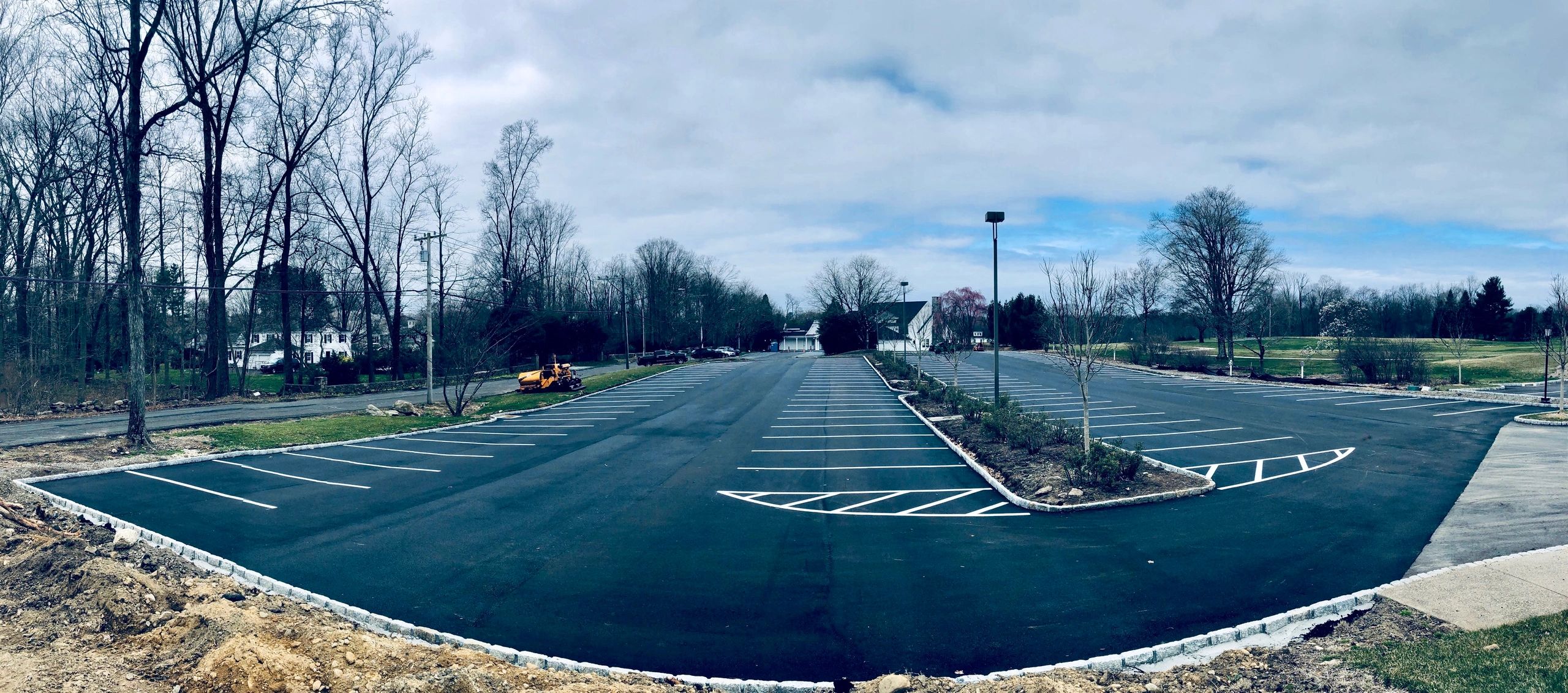 freshly paved parking lot with line striping in Stamford, CT - commercial paving Fairfield County

