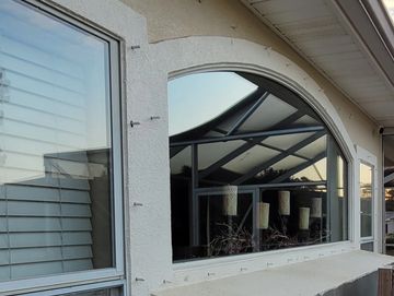 Professionally cleaned arched windows in Brandon-Flowood-Madison and Jackson, MS by Pinnacle Pros.
