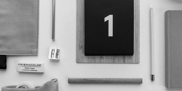 A number one sign sitting on top of a table.