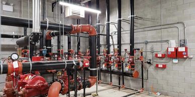 Industrial piping and valve system inside a building.