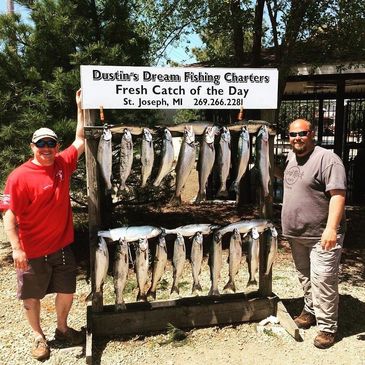 Shawn and Steve salmon and trout fishing on Lake Michigan.