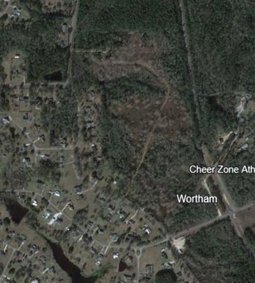Aerial view of wooded and residential area around Wortham.