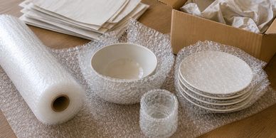 Bubble wrap and packing paper for fragile moving items.