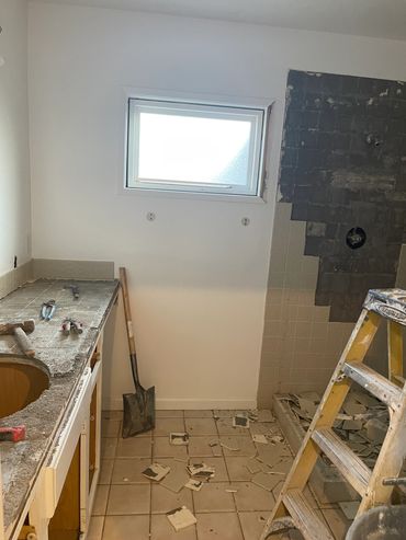 Bathroom demolition, Remove one sink vanity to convert into two sinks vanity. Old shower demolition.