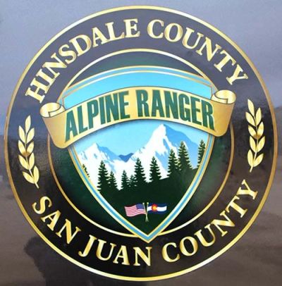 Hinsdale County Alpine Ranger emblem with mountain and flag imagery.