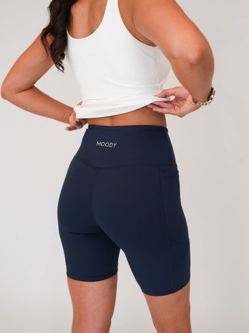 Content for local activewear business Moody Collective. Female model wearing Moody cycling shorts.
