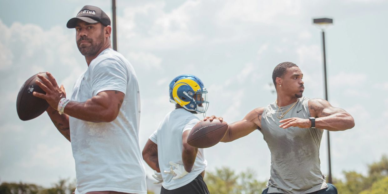 Craig LeBlanc and NFL Quarterback Chandler Rogers throwing Routes on Air with NFL RB Royce Freeman. 