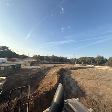 Construction site under clear blue sky.