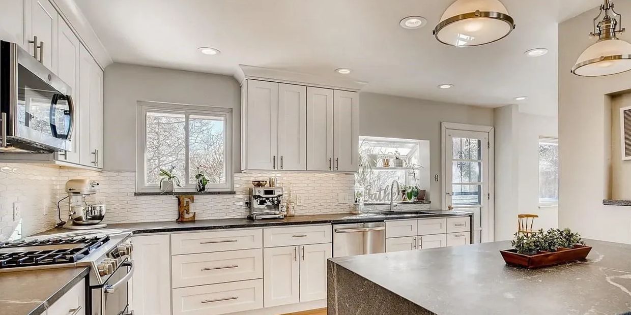 mid-century kitchen design in Bismarck North Dakota with honed countertops and custom cabinets.  
