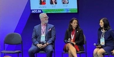 Panel discussion at the American College of Cardiology conference with experts seated on stage.