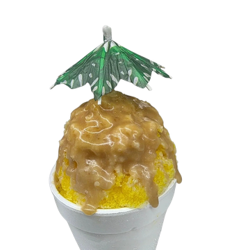 Yellow shaved ice dessert with creamy topping and green umbrella.