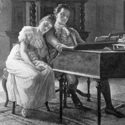 A young couple in historical attire at a harpsichord, sharing a quiet moment.