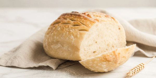 Freshly baked rustic bread with a crusty exterior.