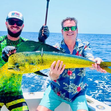 Client showing off his colorful mahi