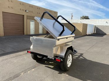 Tilt lid custom camping trailer