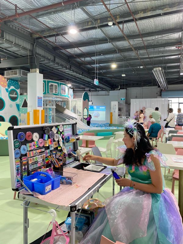 Artist Tina preparing for her next face painting party.