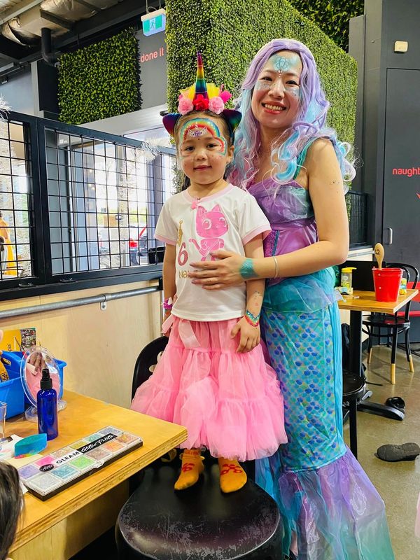 artist Tina with her face painting girl