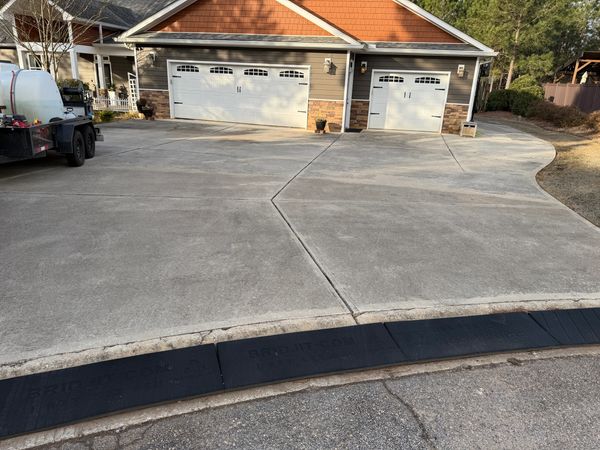 Concrete driveway before professional cleaning in Macon GA