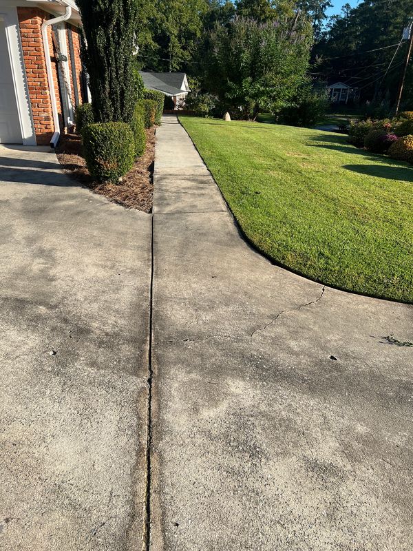 Concrete walkway before pressure washing in Macon GA