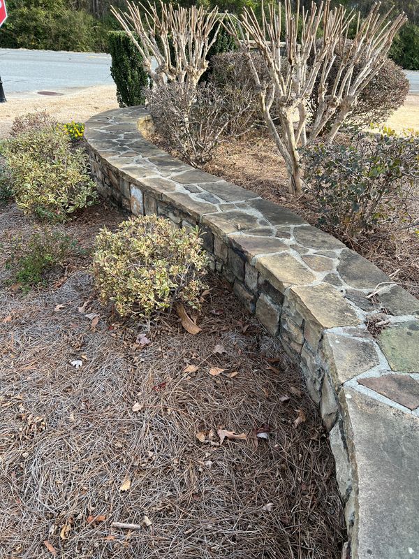 Dirty stone retaining wall. 