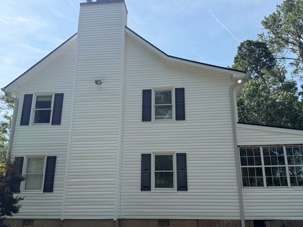 Clean vinyl siding after professional soft wash house washing in Jones County GA