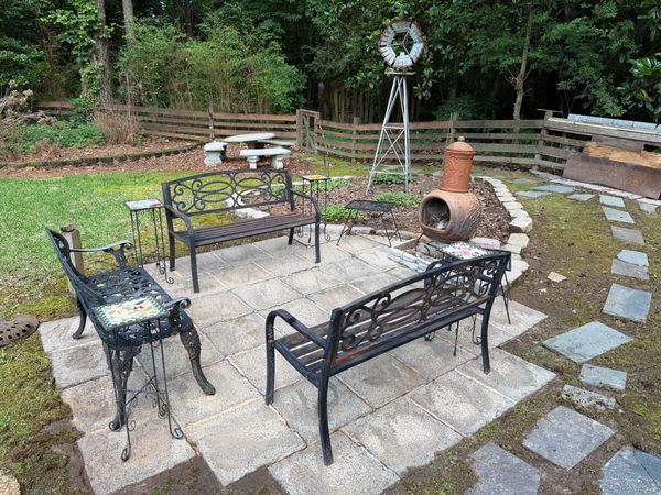 Outdoor patio and paver area after professional exterior cleaning removed significant organic buildu