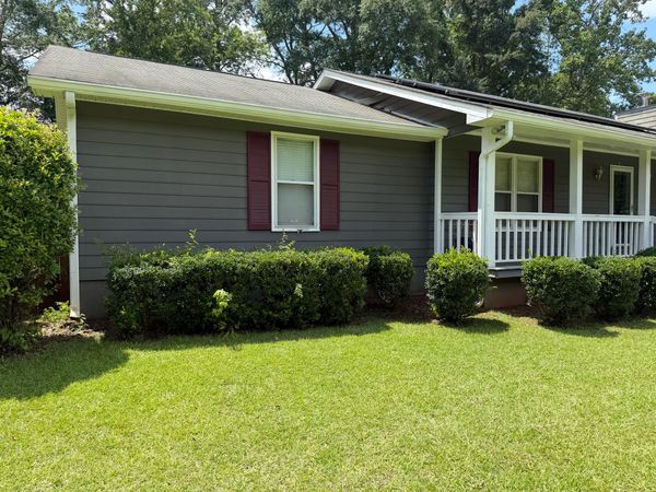 Clean home siding after professional soft wash house cleaning by Georgia Grime Fighters in Macon, GA